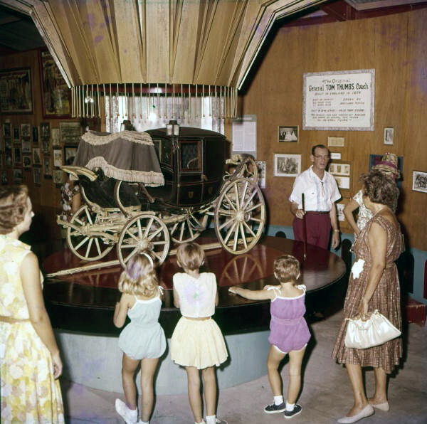 Florida Memory Visitors viewing General Tom Thumb's coach at the
