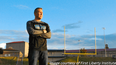 Coach Kennedy is returning to the gridiron after winning religious