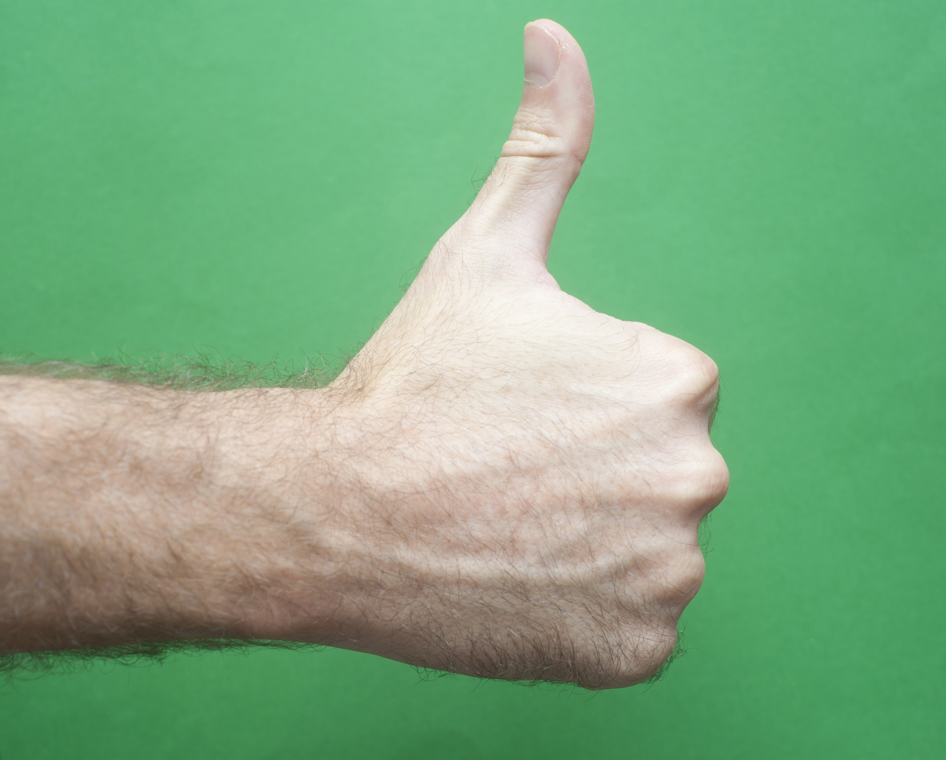 Free Image of Man Hand Showing Thumbs Up Sign Freebie.Photography