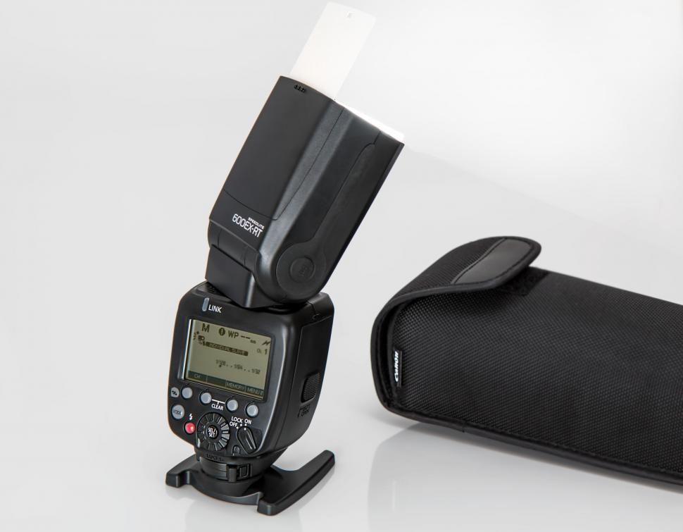 Free Stock Photo of flash unit external flash canon speedlite camera accessory strobe