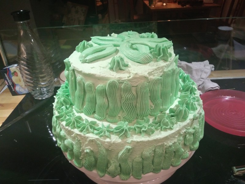 cake covered in green buttercream