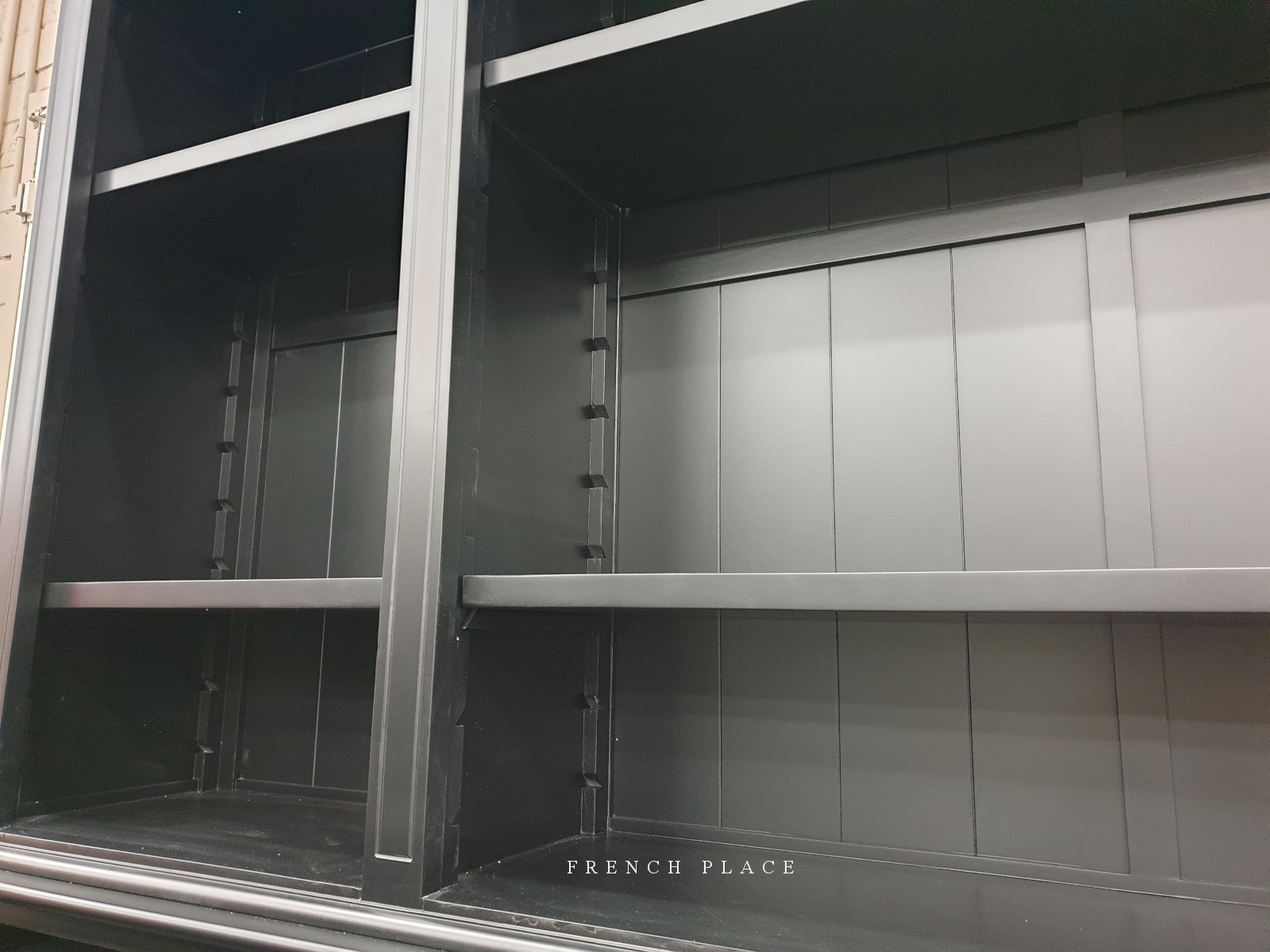 Black Hamptons style bookcase French Place