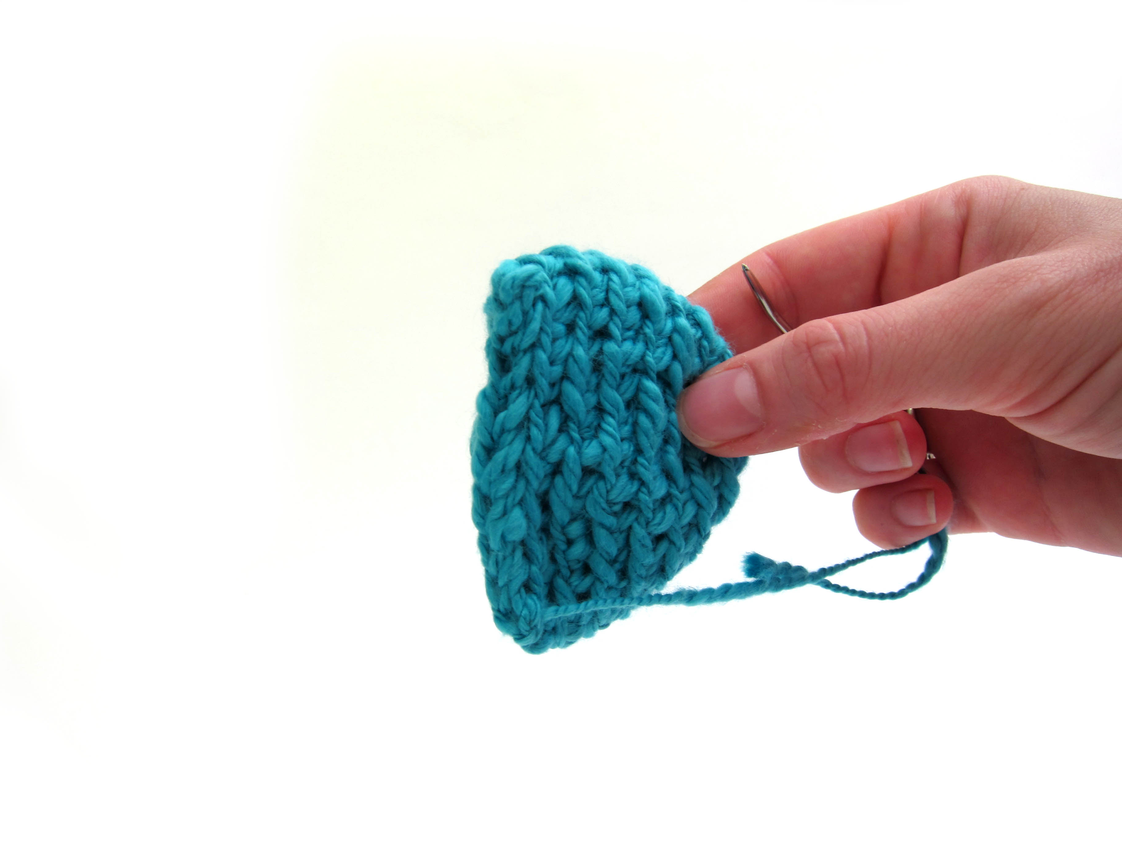 How to attach a folded ear to amigurumi Shiny Happy World