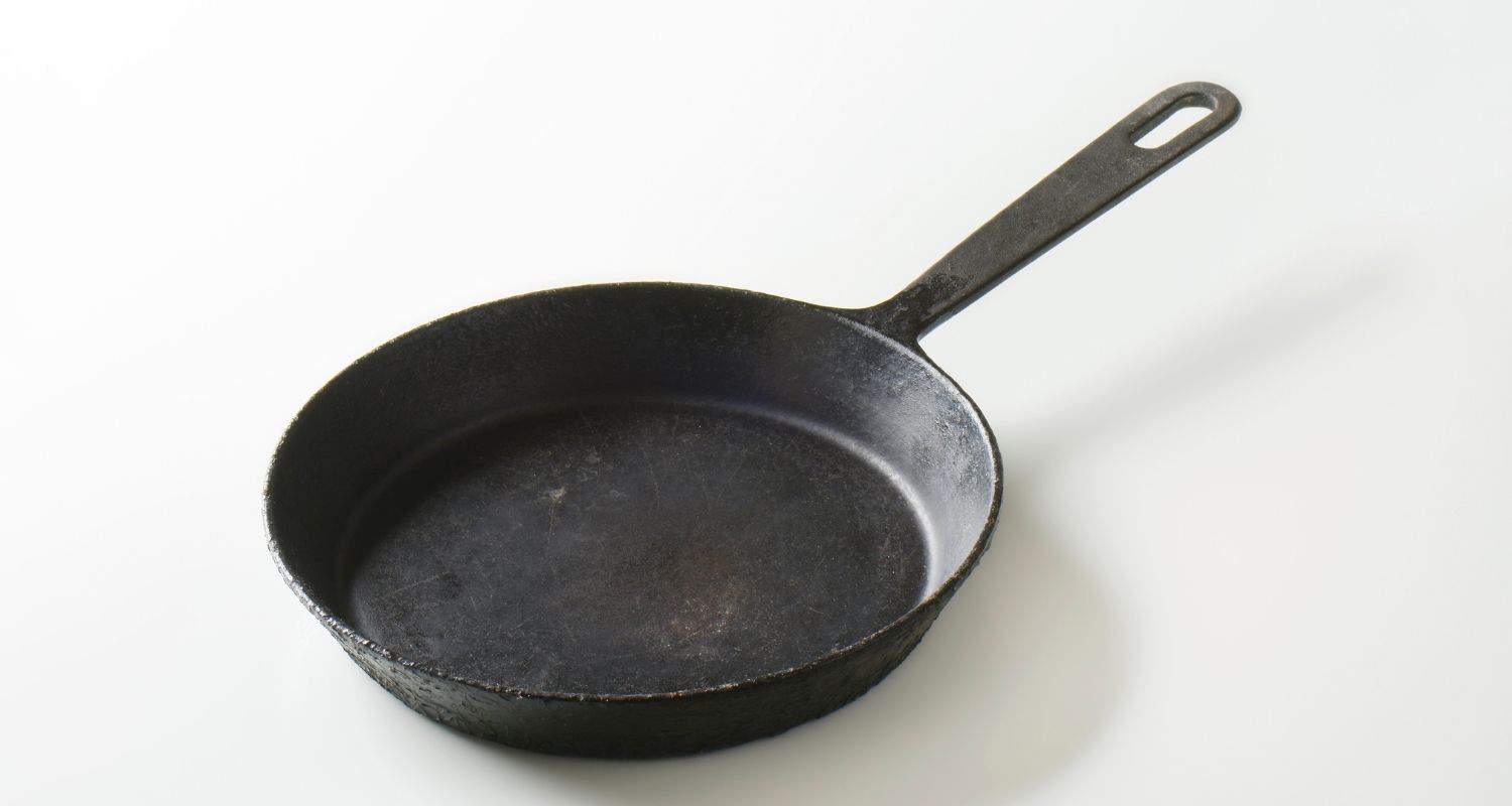 Why does my cast iron skillet has black residue? Frying Pro
