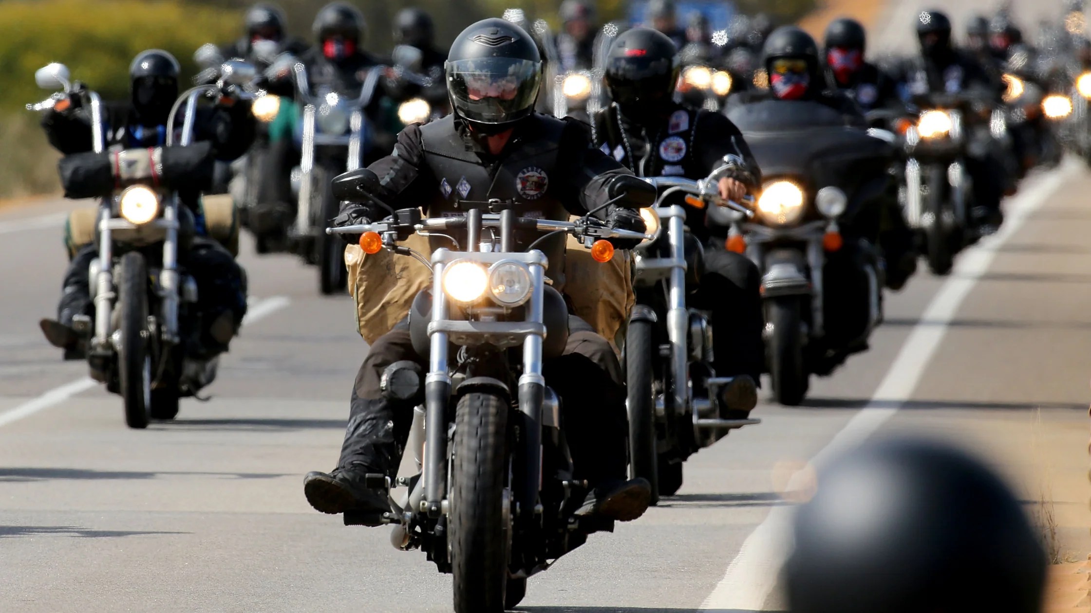 Why do bikers wear harness boots?