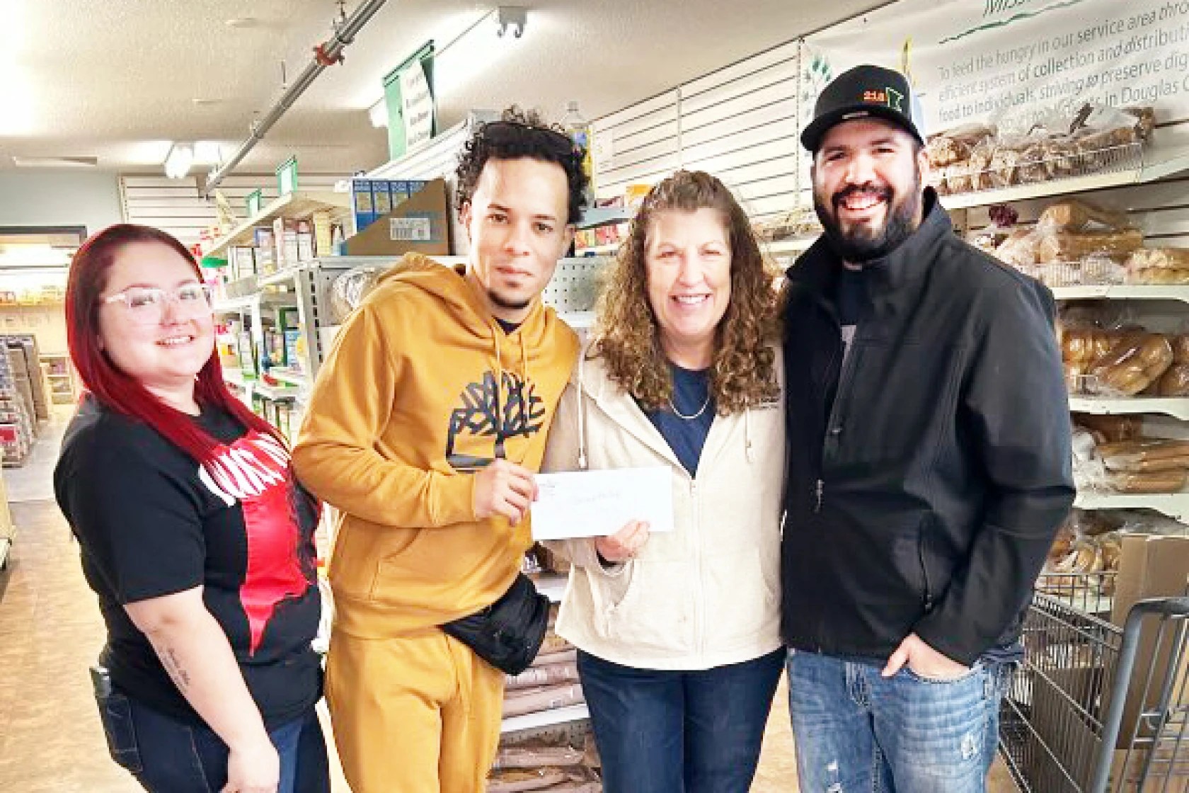 Long Prairie company donates to Alexandria Food Shelf Farmers Union