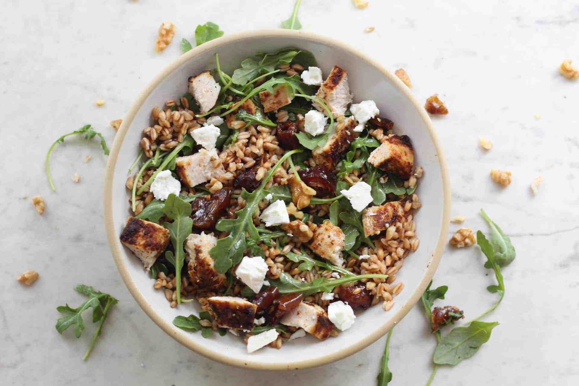 Farro Salad with Harissa Chicken, dates, goat cheese and walnuts
