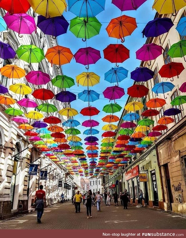 Umbrella shaded walkway in Timișoara, Romania FunSubstance