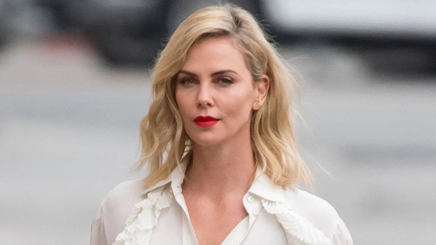 Theron had a tough life growing up