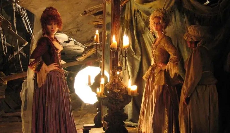 Giselle and Scarlett in a still from Pirates of the Caribbean: Tales of the Code: Wedlocked