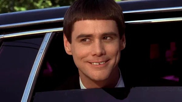 Jim Carrey’s iconic bowl haircut and clipped tooth as Lloyd Christmas in Dumb and Dumber
