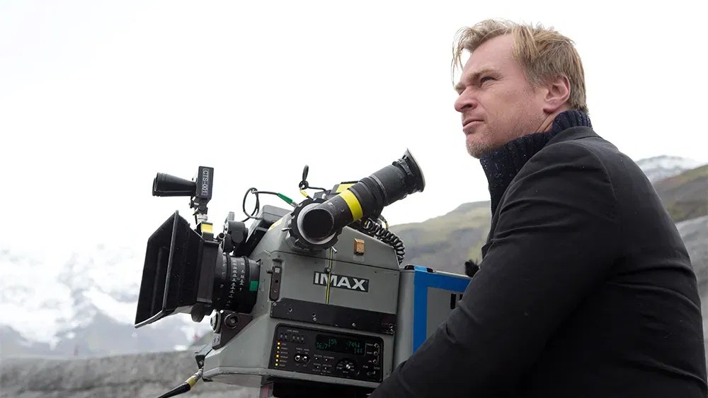 Christopher Nolan using an IMAX camera during the shoot of his movie