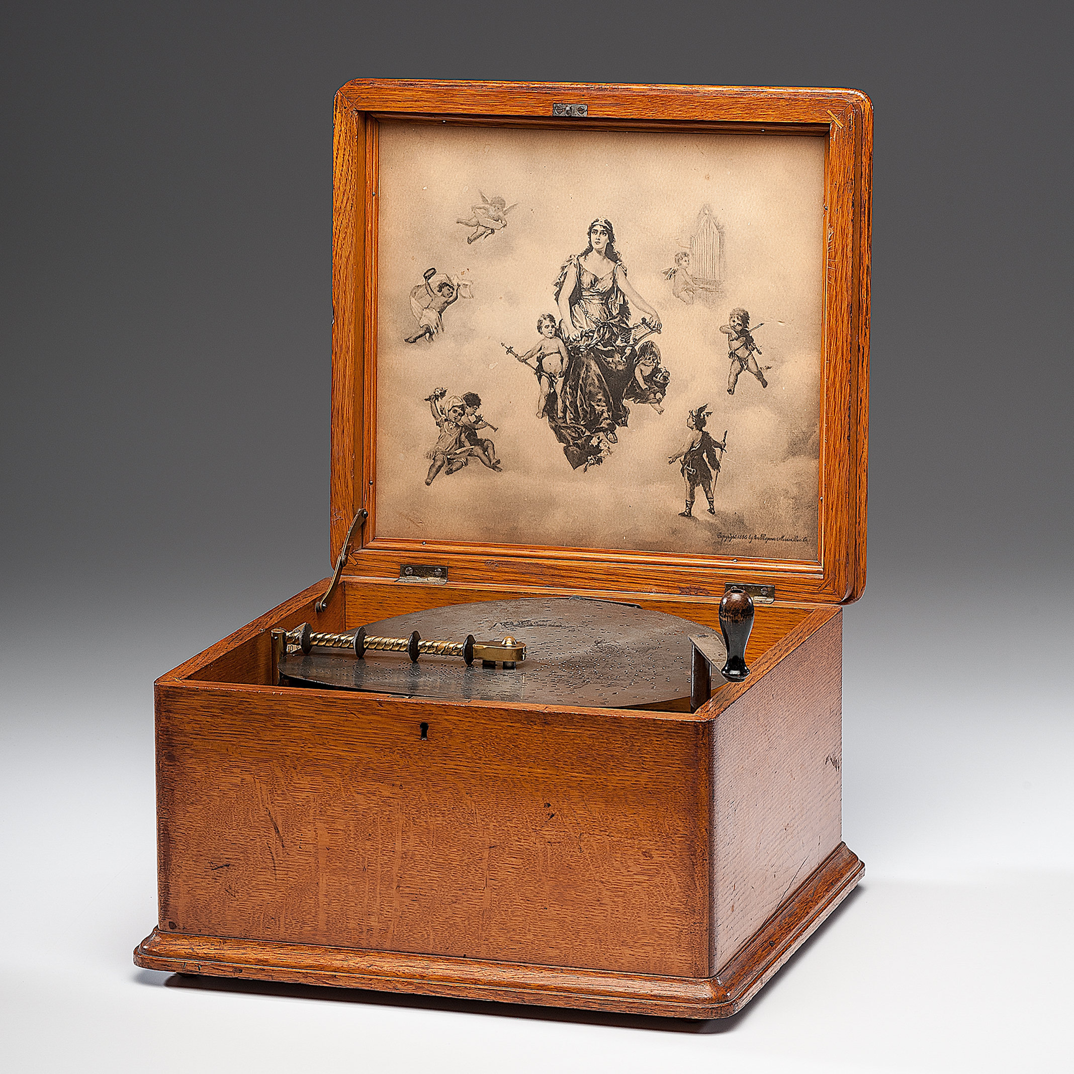 Regina 11 Inch Disc Music Box Cowan's Auction House The Midwest's