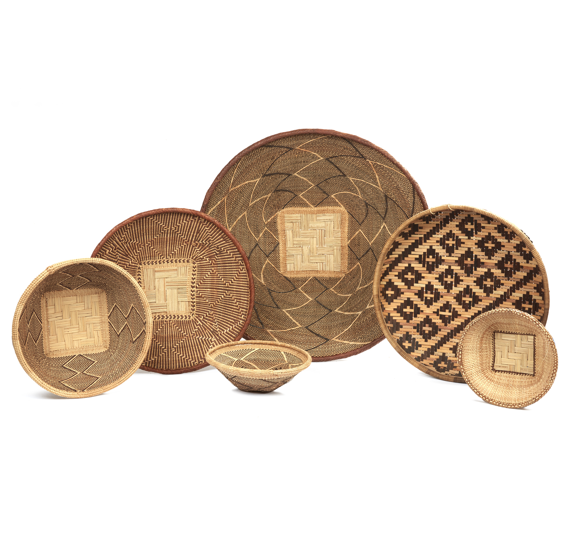 Kikuyu, Kenya “Uteo” Winnowing Basket, Four Binga Zimbabwe Baskets, and