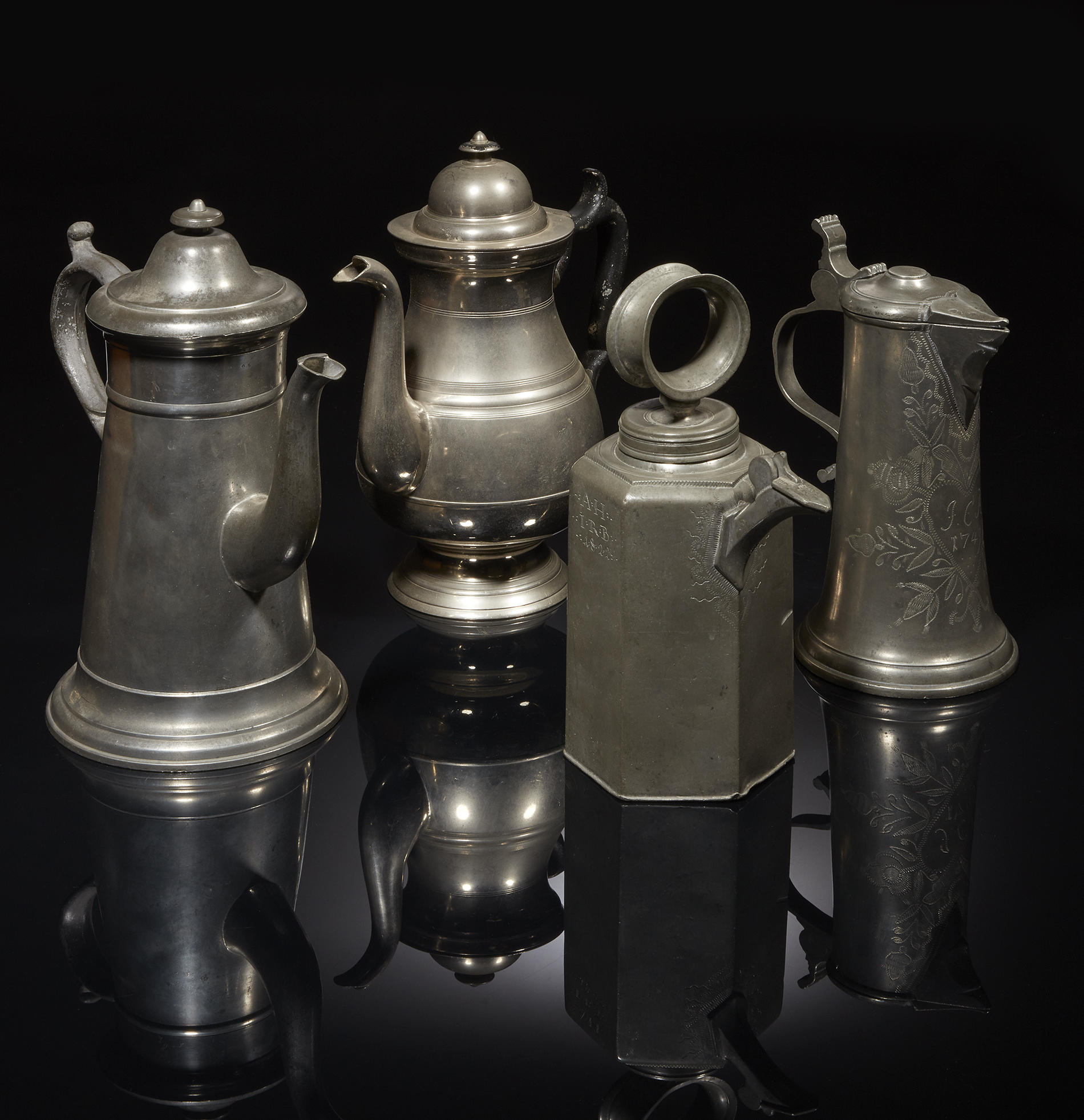 Four Pewter Pitchers Witherell's Auction House