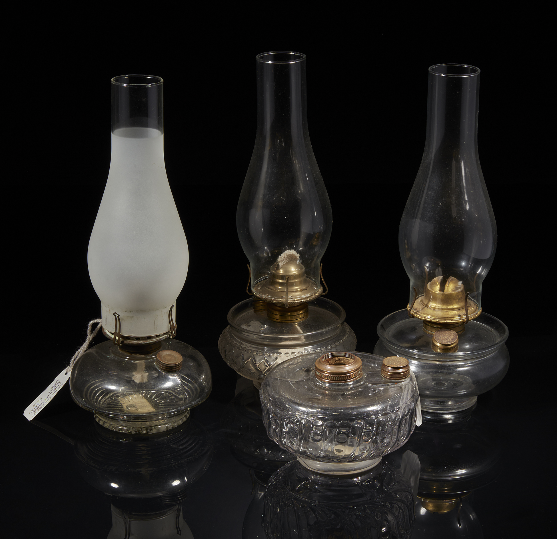 Four Clear Glass Oil Lamps Witherell's Auction House