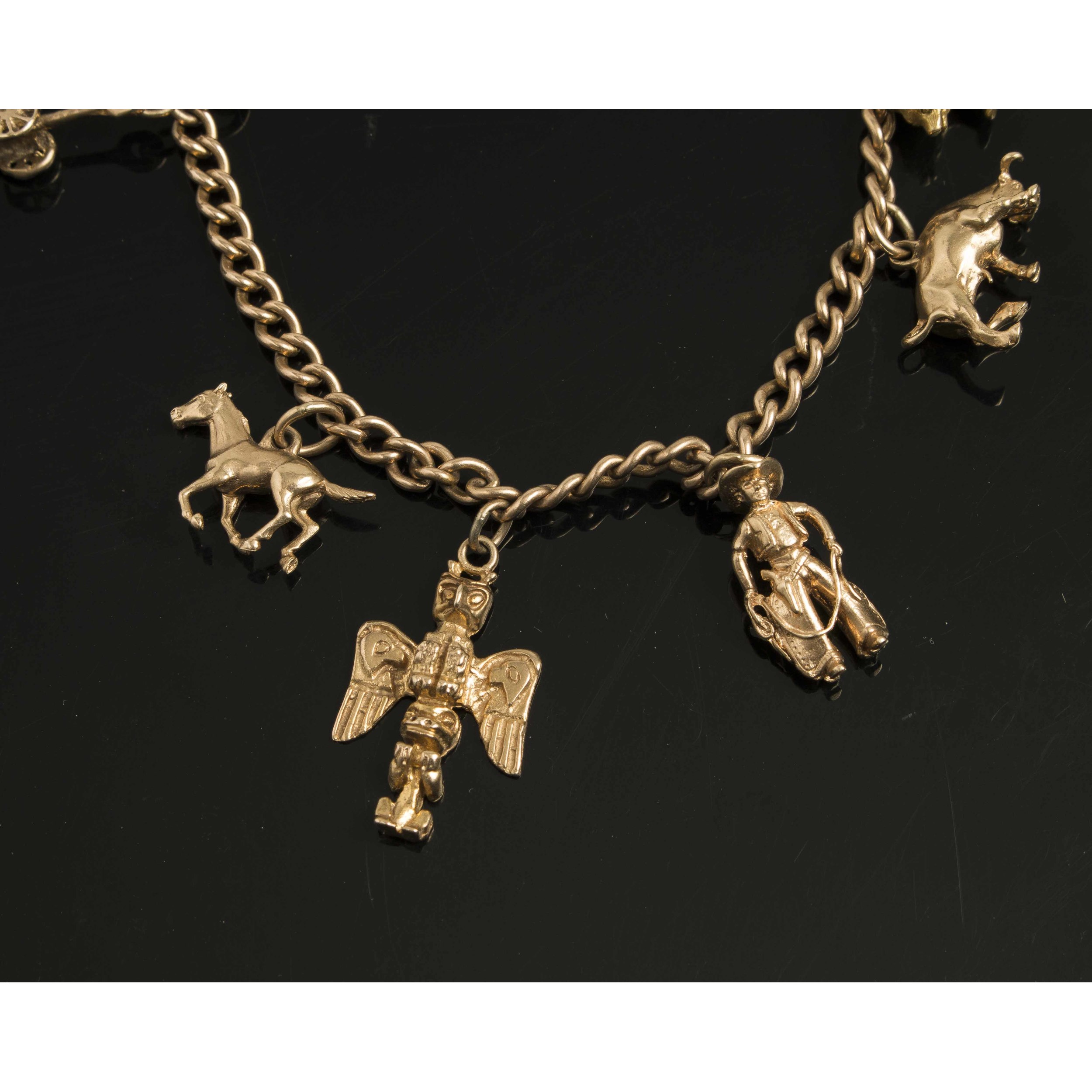 Gold Bracelet with Seven Western Themed Charms, 1014K Witherell's