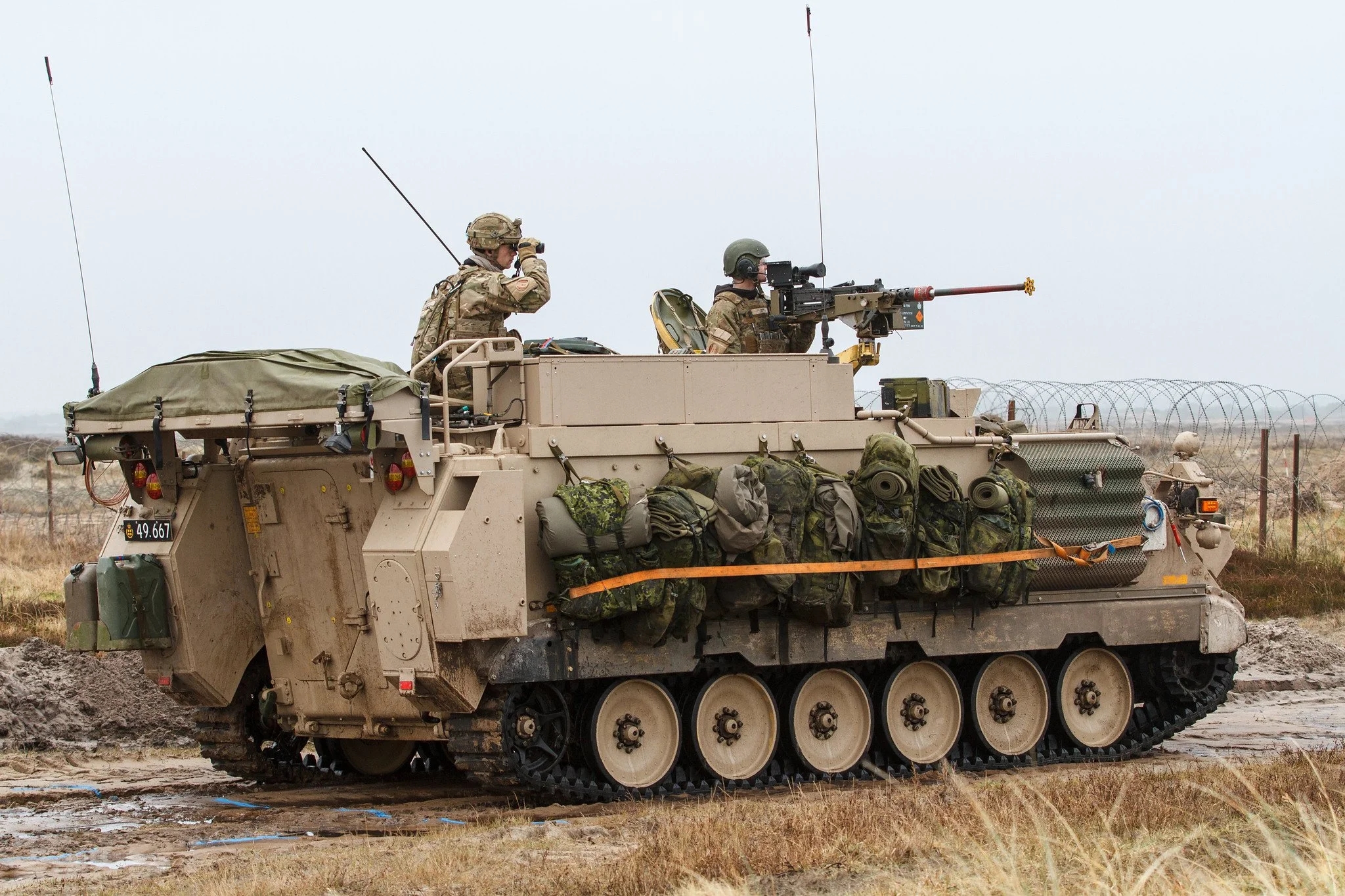 Bushmaster armored vehicles, M113 armored personnel carriers and
