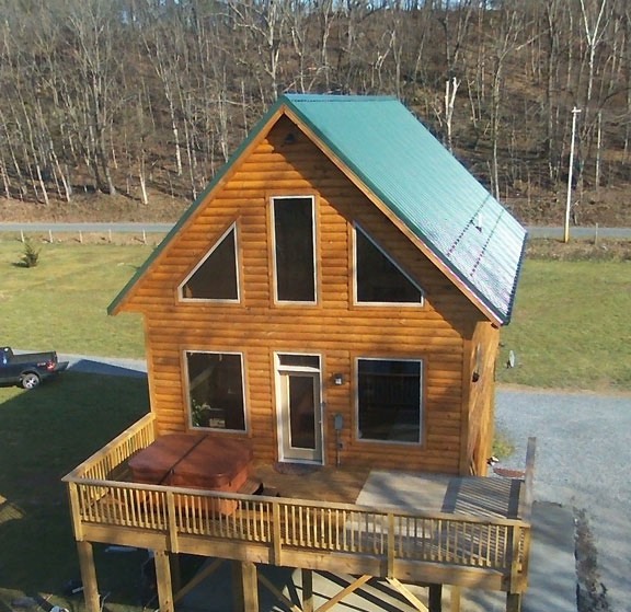 3 Cozy log cabins on the river Gander Island Cabins