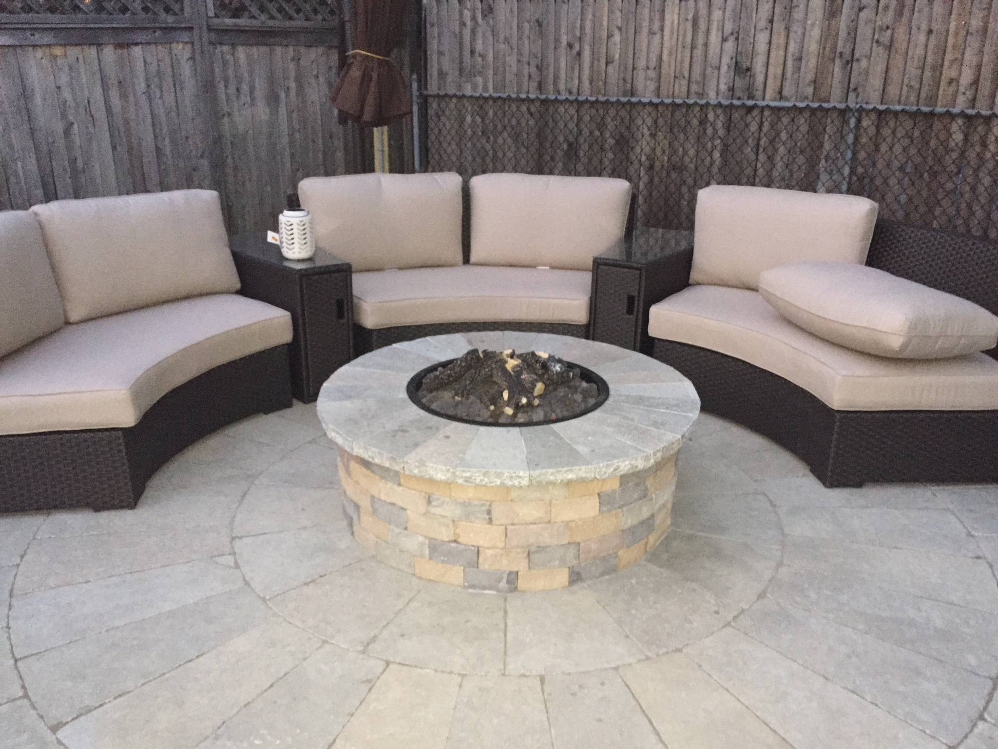 Custom Outdoor Fire Pit, Limestone Patio & Charming Seating Area by