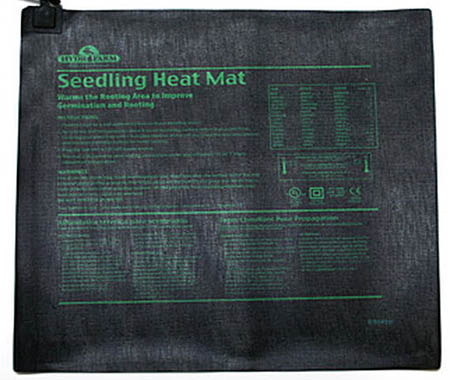 A close up of a seedling heat mat on a white background.
