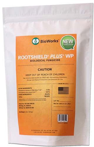 A close up vertical image of the packaging of BioWorks Rootshield plus biological fungicide pictured on a white background.