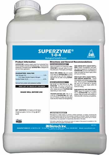 A close up square image of a plastic bottle of Superzyme Biological Growth Factor isolated on a white background.