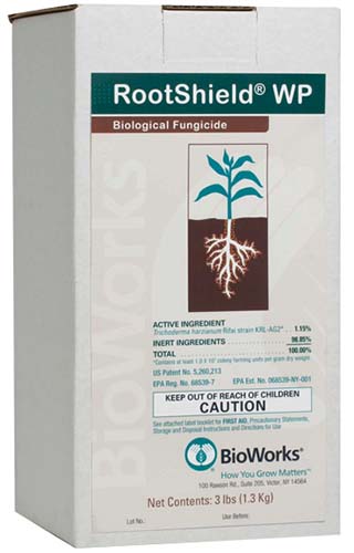 A close up vertical image of a box packaging of RootShield WP biological fungicide isolated on a white background.