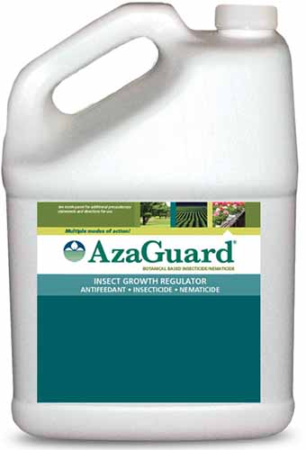 A close up of the packaging of AzaGuard Neem Oil isolated on a white background.