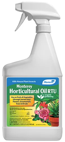 A close up of a bottle of Monterey Horticultural Oil isolated on a white background.