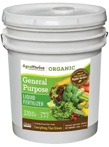A close up of a tub of AgroThrive general purpose liquid fertilizer isolated on a white background.