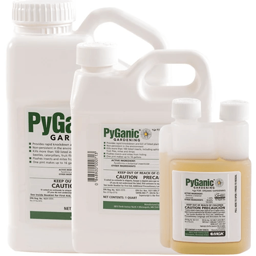 A close up of three bottles of PyGanic Gardening insecticide isolated on a white background.