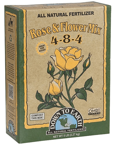 A close up of the packaging of Down to Earth Rose and Flower mix isolated on a white background.