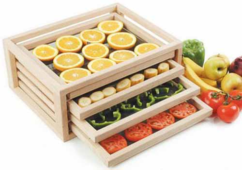 A close up of a sun food drying rack isolated on a white background.