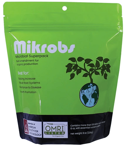 A close up of the packaging of Mikrobs microbial superpack isolated on a white background.