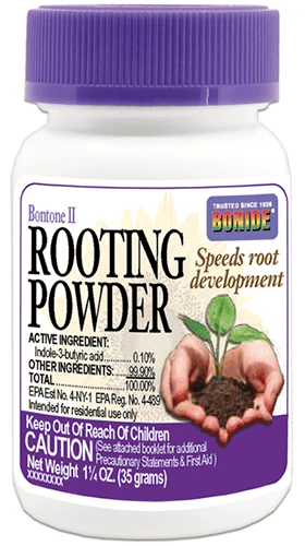 A close up of a bottle of Bonide Rooting Powder isolated on a white background.
