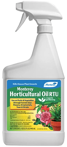A close up of a bottle of Monterey Horticultural Oil isolated on a white background.
