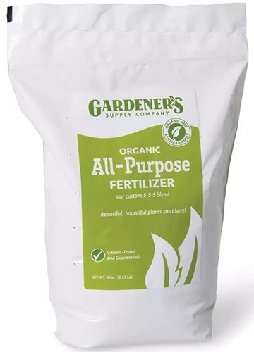 A close up of the packaging of Gardener’s Supply Company Organic All-Purpose Fertilizer isolated on a white background.