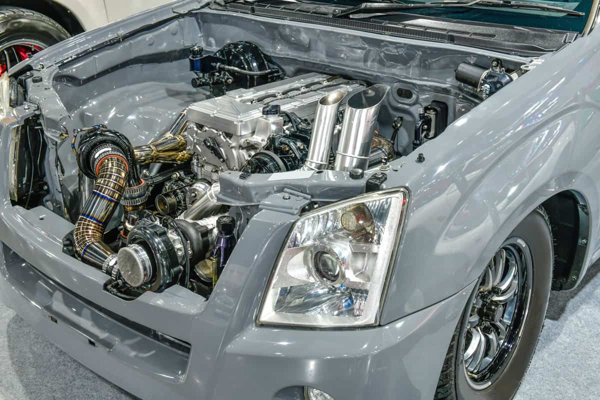 Details of grey car engine. Modification of the turbo engine and header