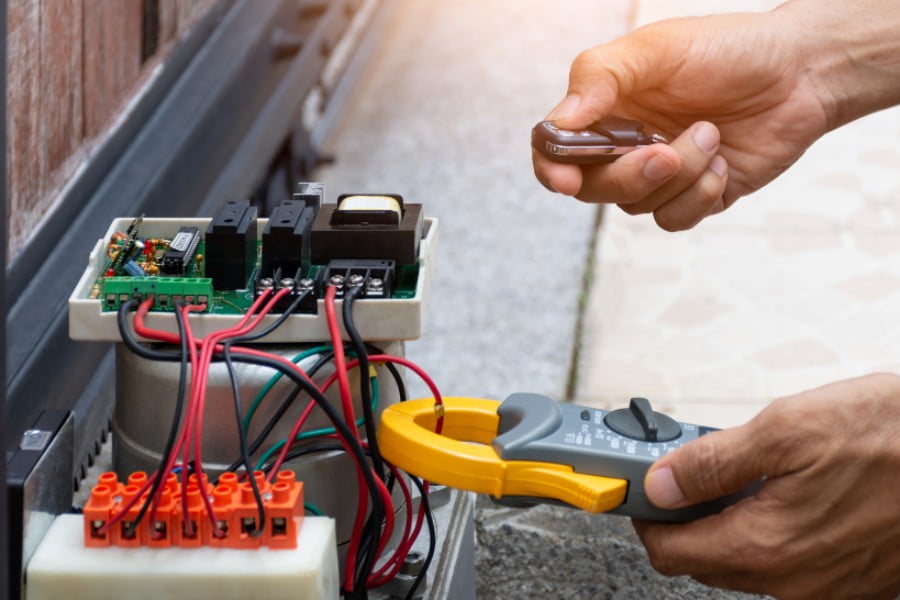 What does a technician check during an automated gate inspection
