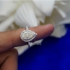 2.00 Ct Colorless VVS1 Pear Cut Halo Moissanite Engagement Ring 14KT White Gold