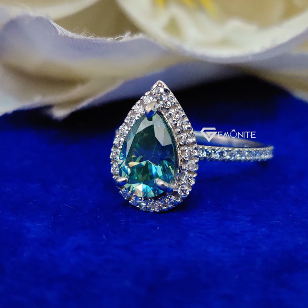 3.0 Ct (12×8 mm) Green Pear Cut Halo Moissanite Engagement Ring