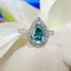 3.0 Ct (12x8 mm) Green Pear Cut Moissanite Engagement Halo Ring