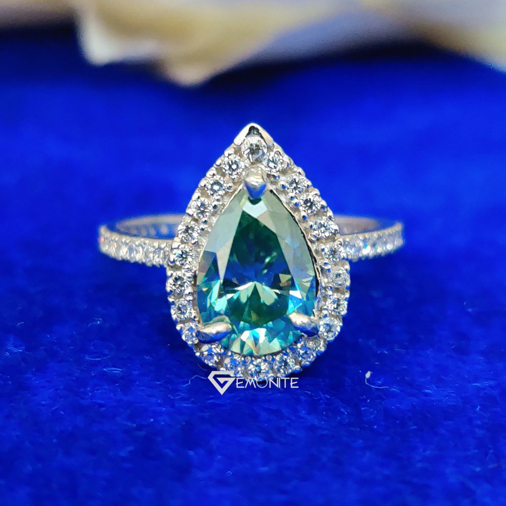 3.0 Ct (12×8 mm) Green Pear Cut Halo Moissanite Engagement Ring