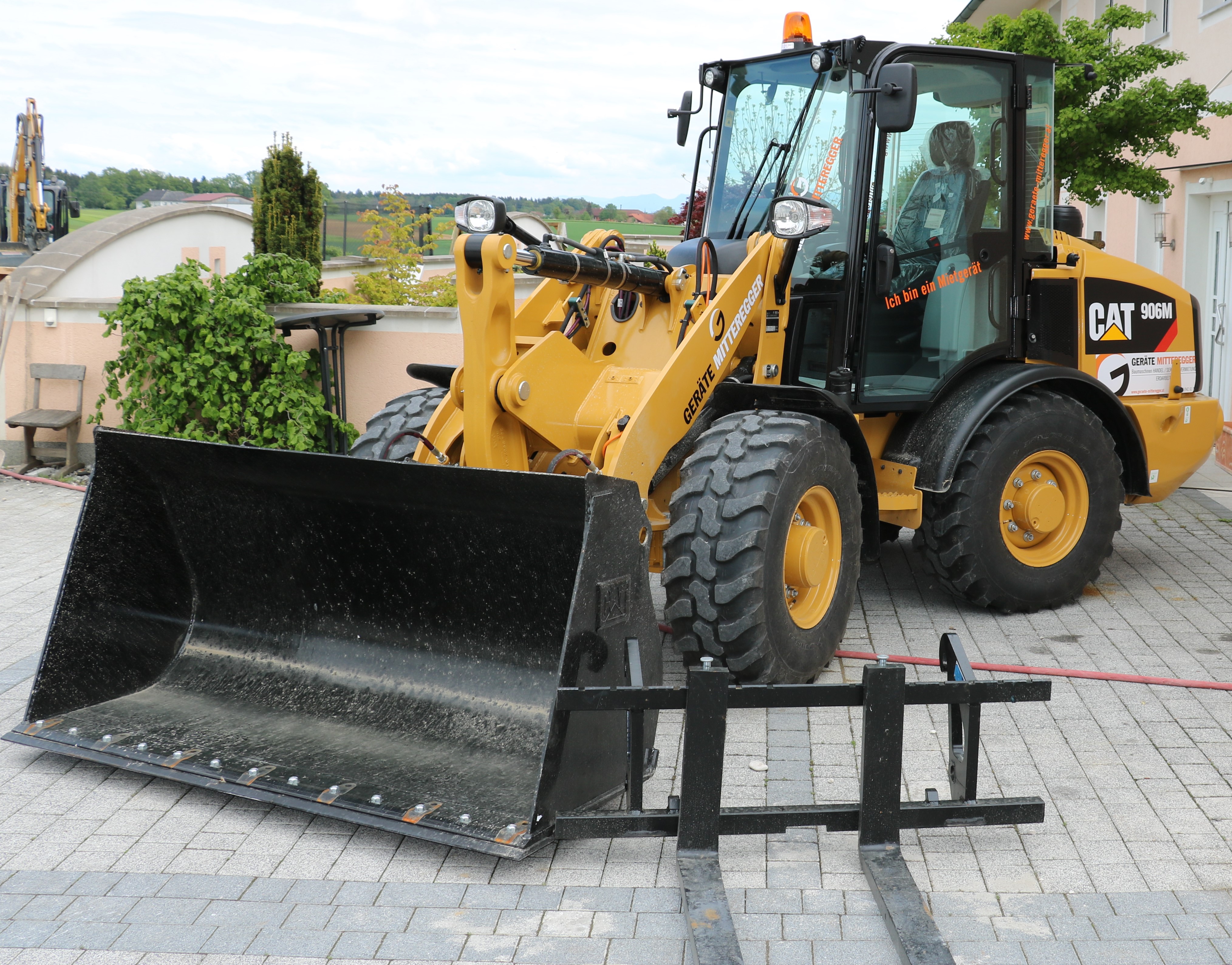 Radlader CAT 906M Geräte Mitteregger