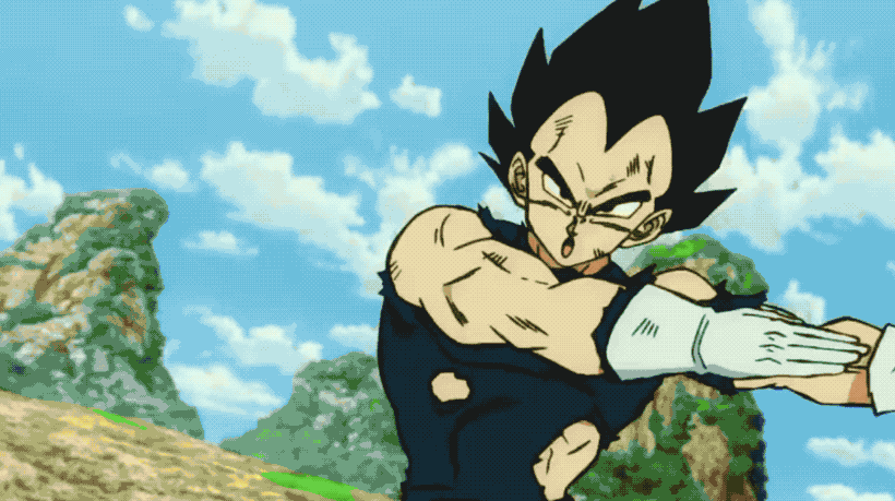 Vegeta and Goku performing the fusion dance.