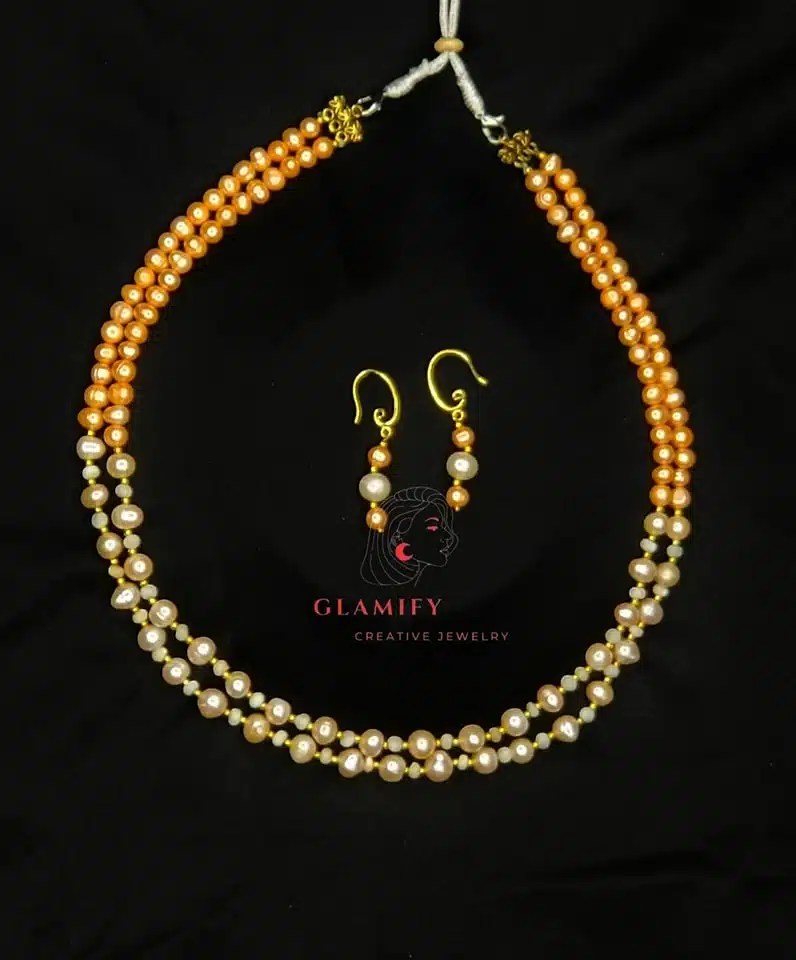 Golden Elegance TwoLayered Pearl Necklace with Tassel Accent