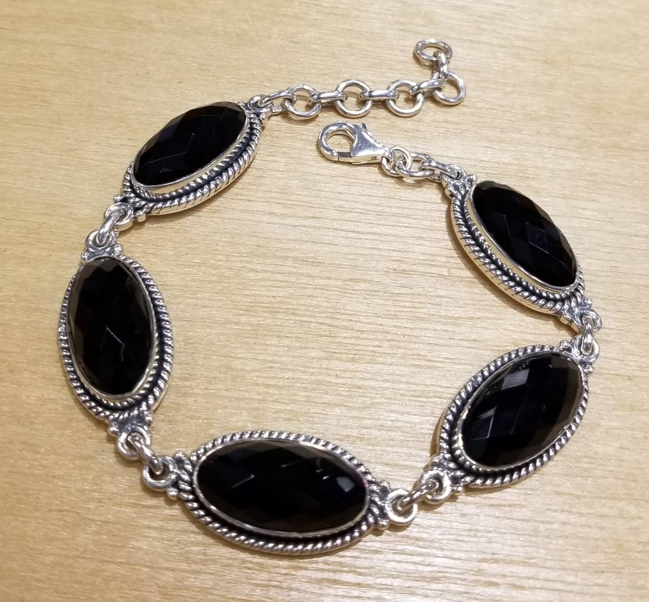 Faceted black onyx and sterling silver bracelet Jewelry by Glassando