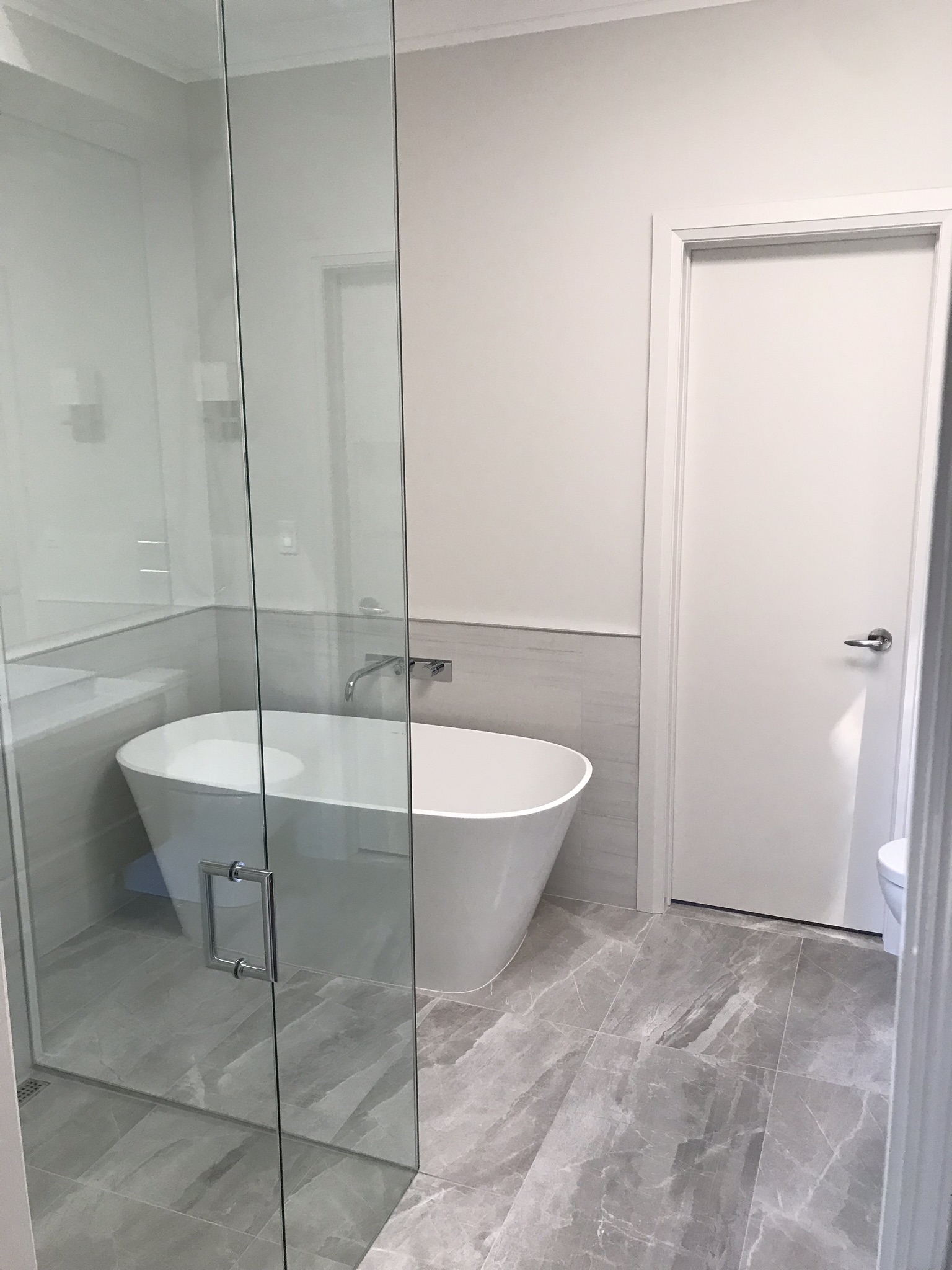 Corner glass shower enclosures : Glass Ninja . Get a custom quote today!