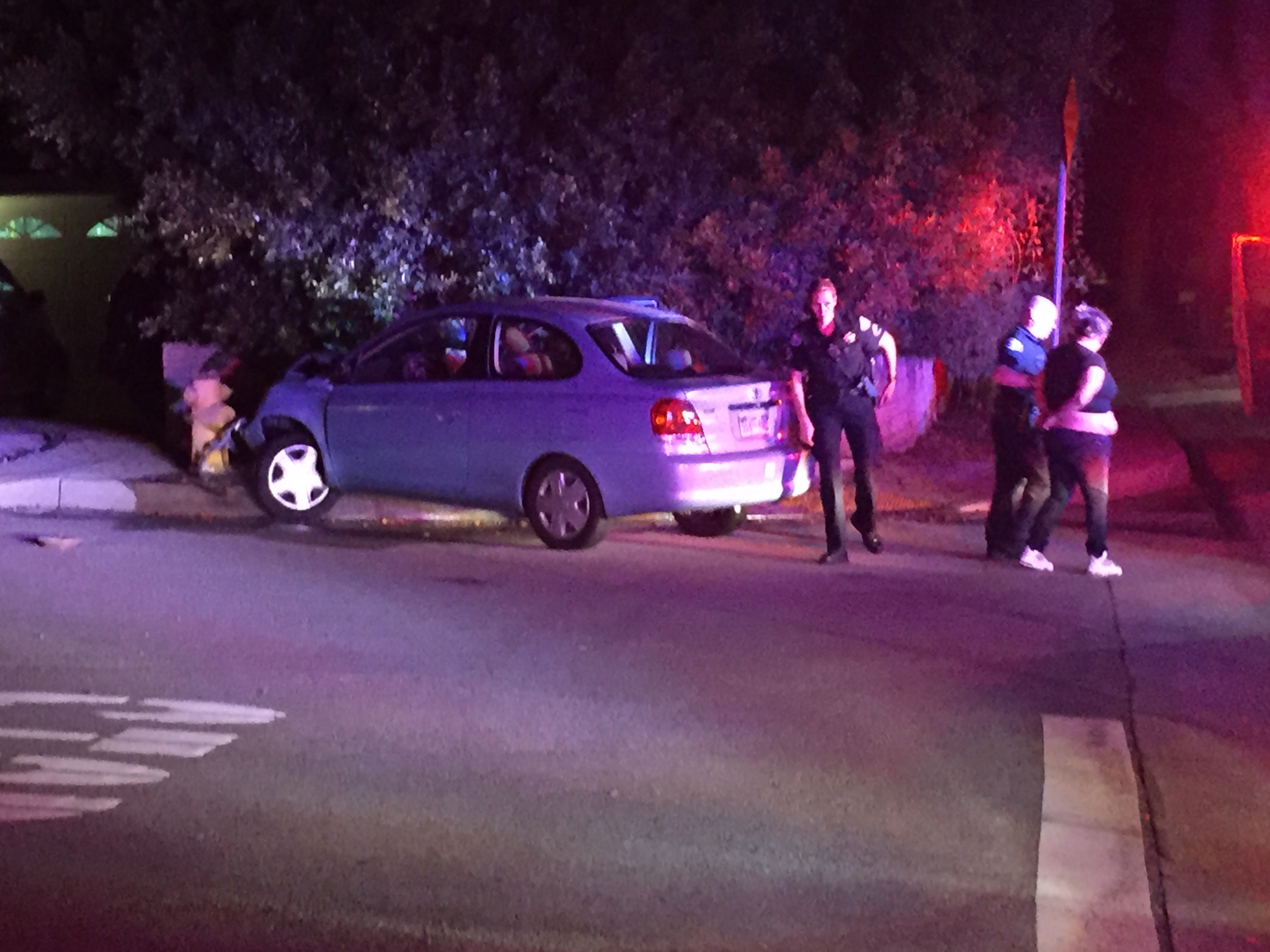Driver Arrested, Passengers Hospitalized After Pursuit Ends in Crash